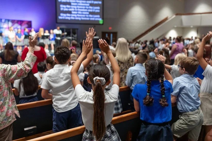 Students worshiping together at a school chapel event